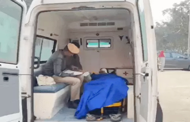 Bus collides with parked truck, conductor killed, six injured