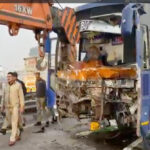 Bus collides with parked truck, conductor killed, six injured