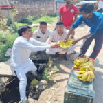 District councilor protested and demanded safe roads by filling potholes.