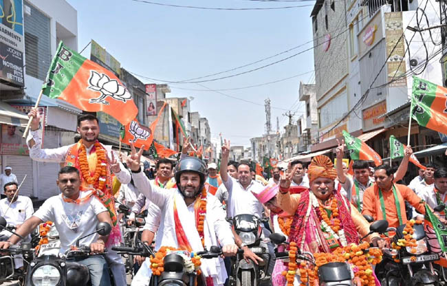 Crowds gathered at BJP's bike rally, claims victory in 22 wards