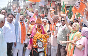 Crowds gathered at BJP's bike rally, claims victory in 22 wards