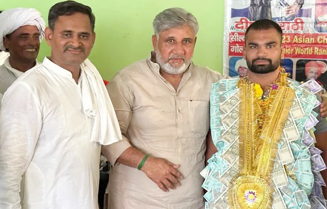 Sonipat Grand welcome for international gold-medalist wrestler Deepak Rathi.