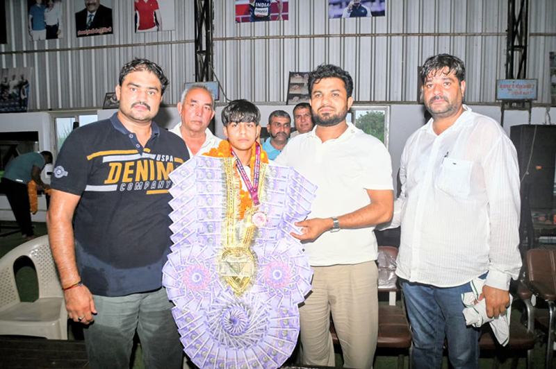 Asian bronze medalist wrestler Nisha Mor receives a grand welcome in Larsauli village; MLA Kadian honors her.
