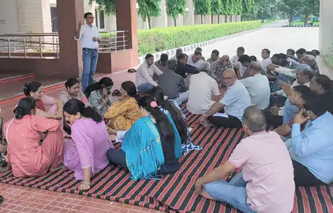 Employees stop work over SDE's suspension at DCRUST.